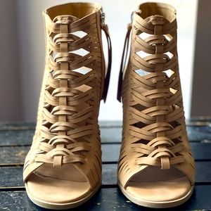 Sandals with woven/braided detail.